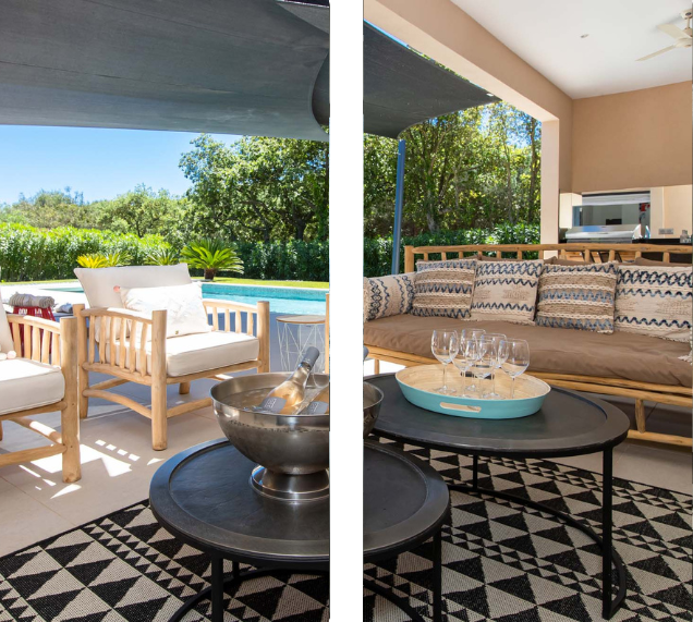 A stylish black and white patterned rug outside the villa, adding a touch of elegance to the surroundings.